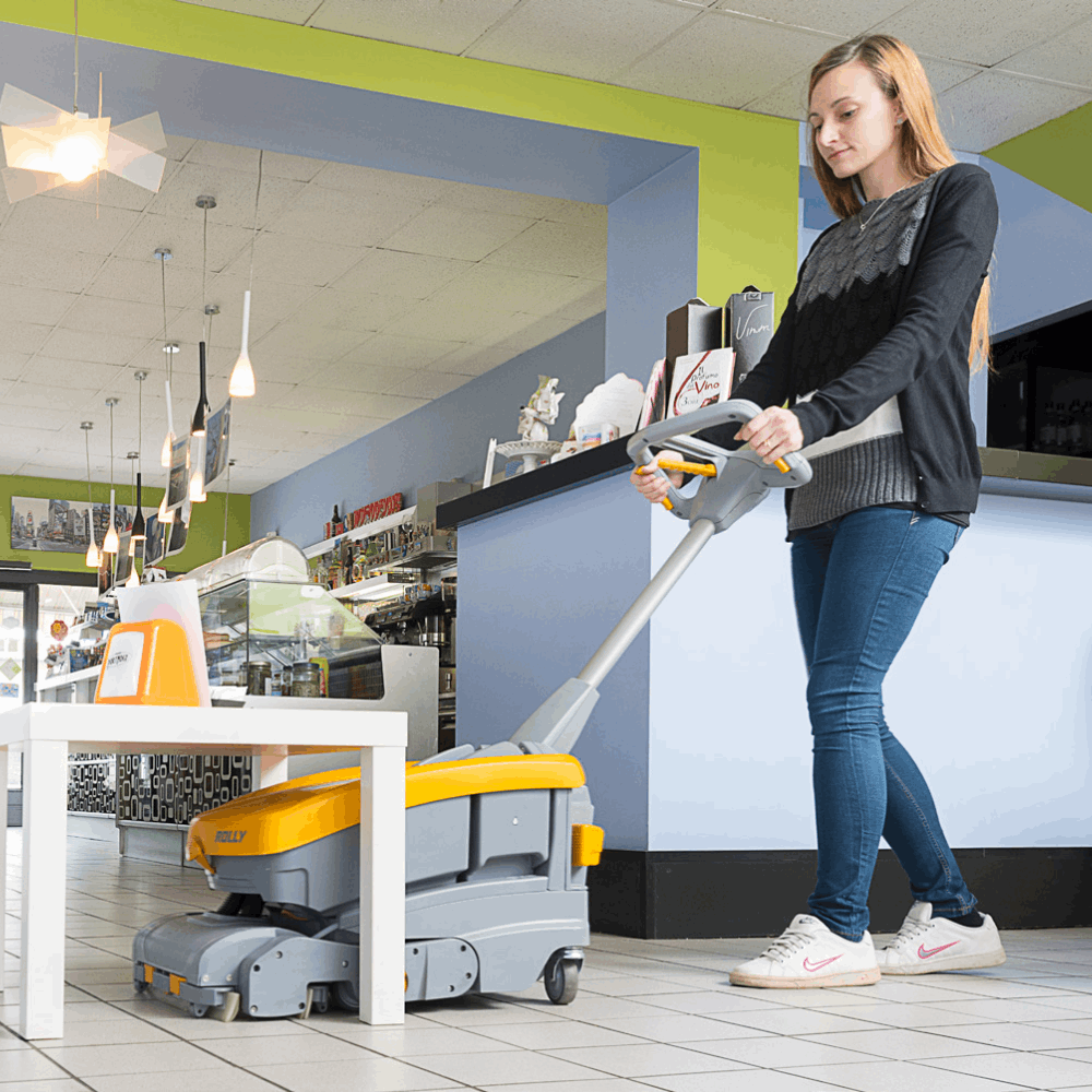 Efficient battery-operated scrubber dryer for cleaning floors in small areas, corridors, and beneath furniture.