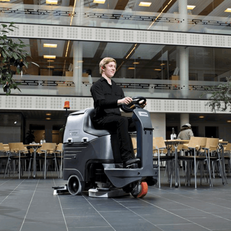 Nilfisk BR652 ride-on scrubber dryer floor cleaning machine for large spaces