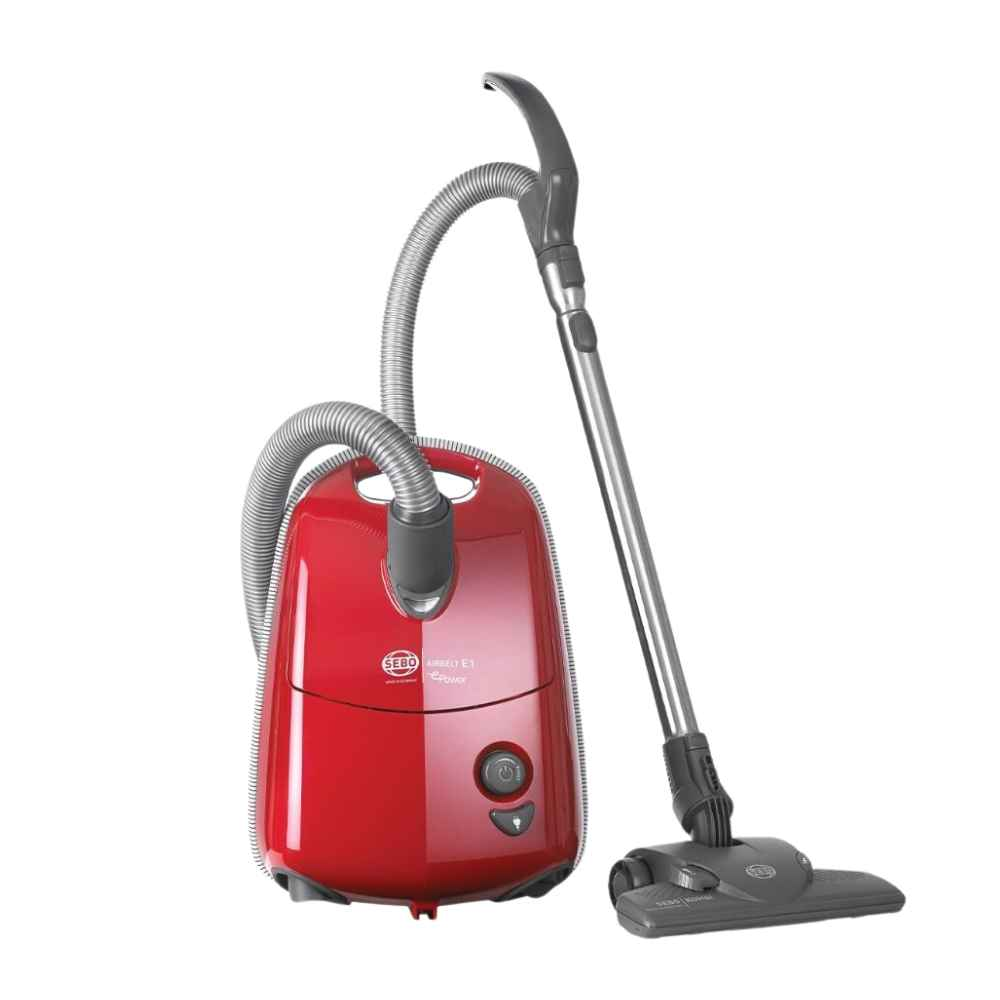 Sebo E1 Red vacuum cleaner with Kombi Floor head, crevice and upholstery nozzles, 3.5-litre bag, and excellent filtration.